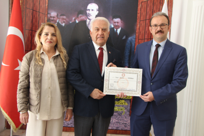 TAHSİN BECAN MAZBATASINI ALDI