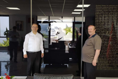 Hakan Bağcı Mehmet Temel’i yeni hizmet binasında ziyaret etti