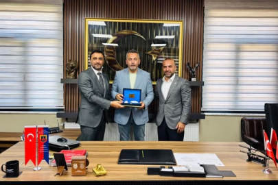 Güçlü'den şehit aileleri ve gazilere ziyaret