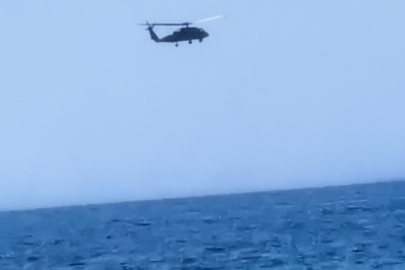 Denizin ortasındaki helikopter merak konusu oldu
