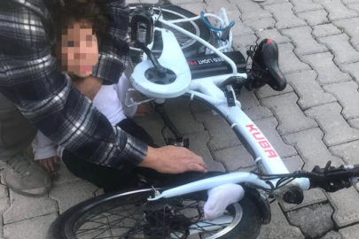 Ayağı bisiklete sıkışan minik çocuğun imdadına itfaiye yetişti