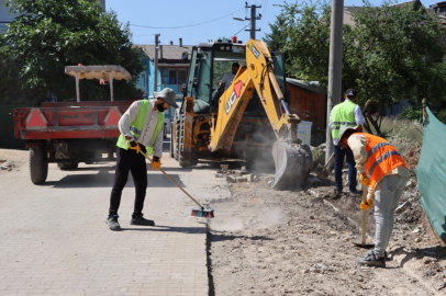 Binlerce ton asfalt, on binlerce metrekare yol çalışması